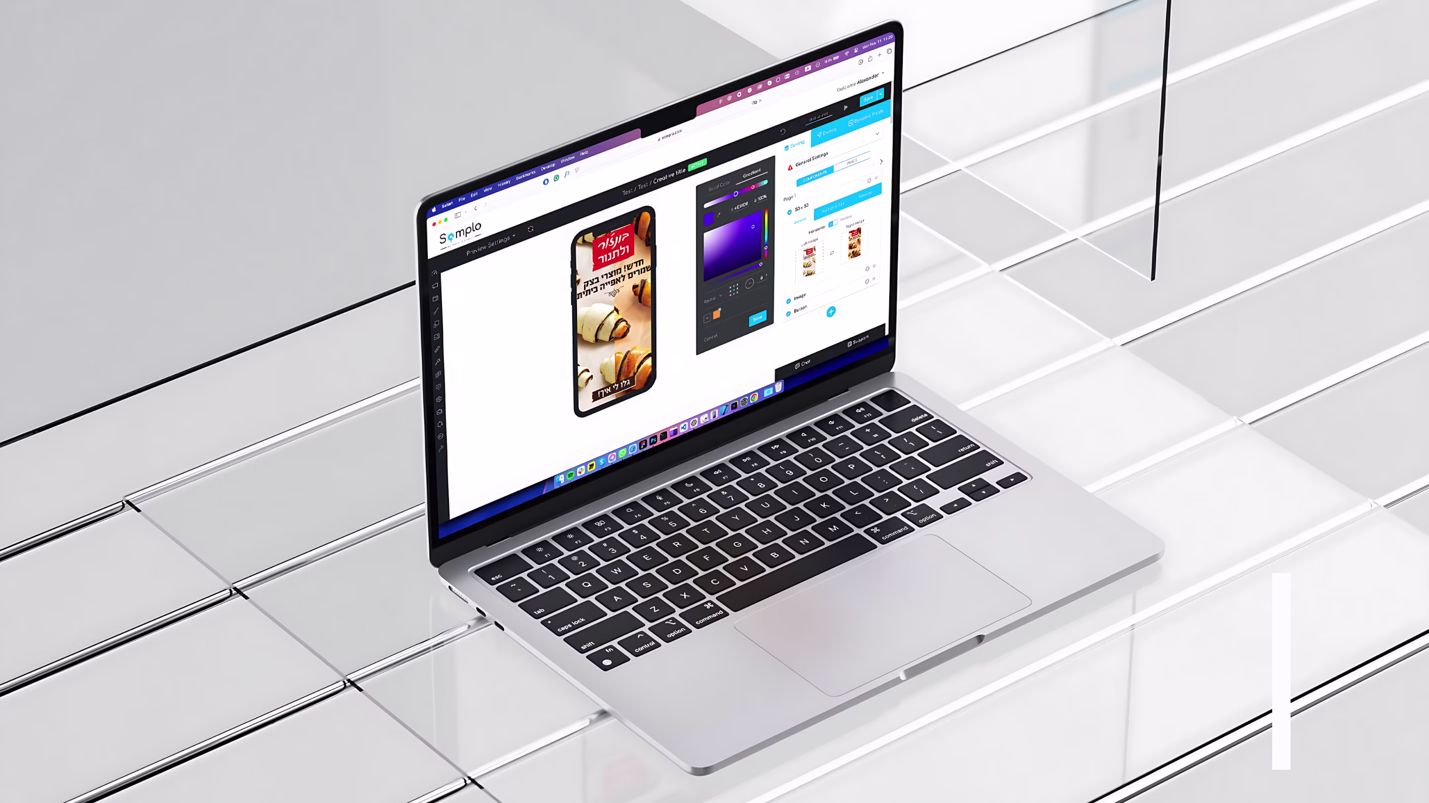 Somplo Creative Studio open on MacBook with mobile ad preview